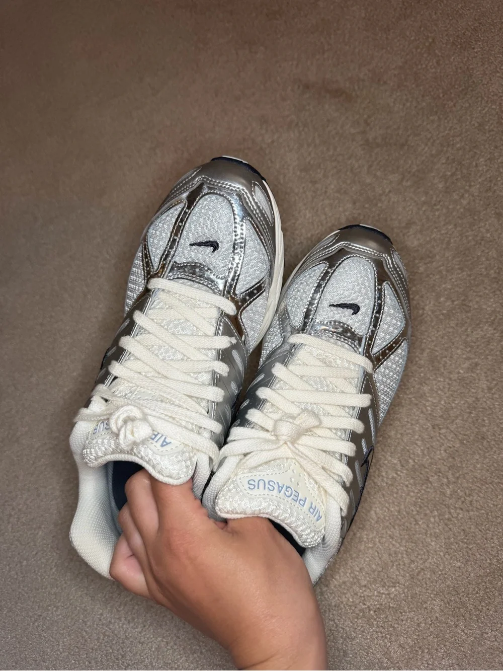 Nike Women’s Silver & White Running Sneakers with Black Swoosh